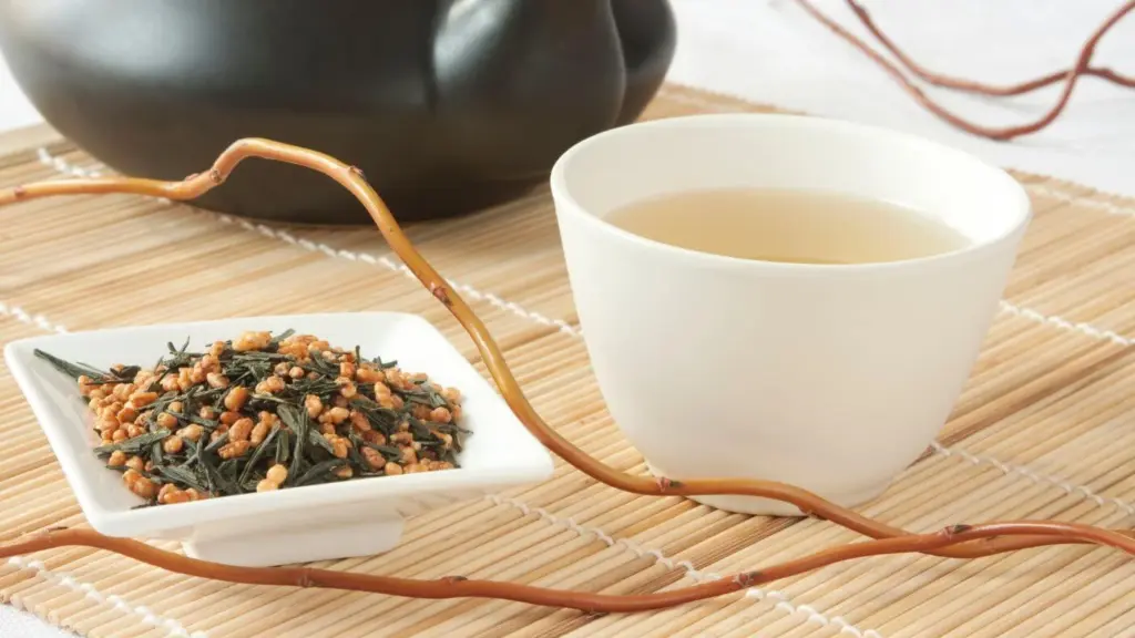 Japanese Genmaicha green tea with roasted brown rice served in a white cup